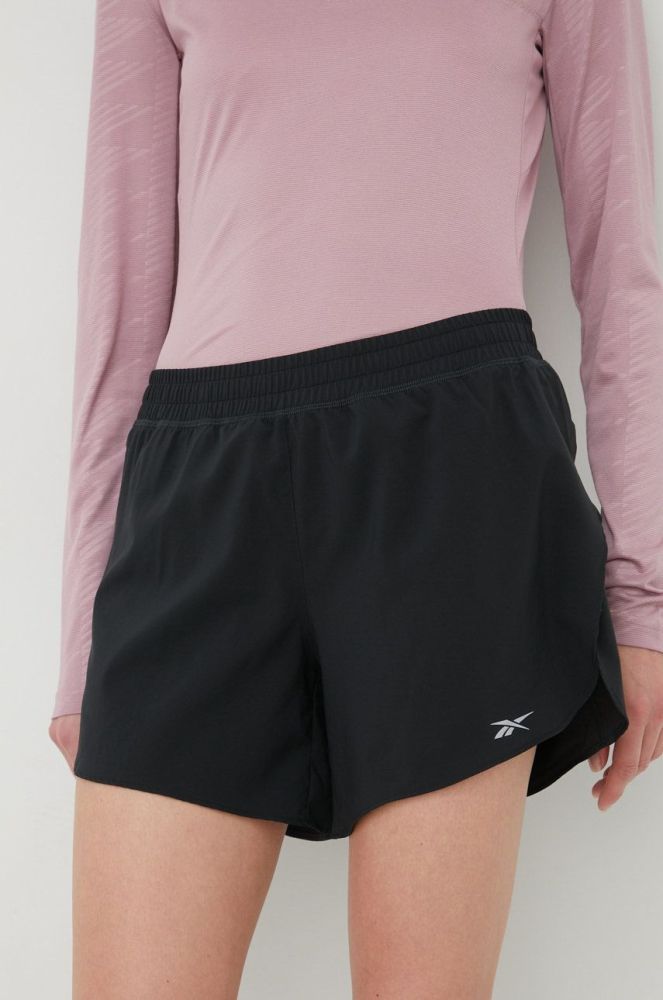 Шорти для бігу Reebok HA1043 жіночі колір чорний однотонні середня посадка